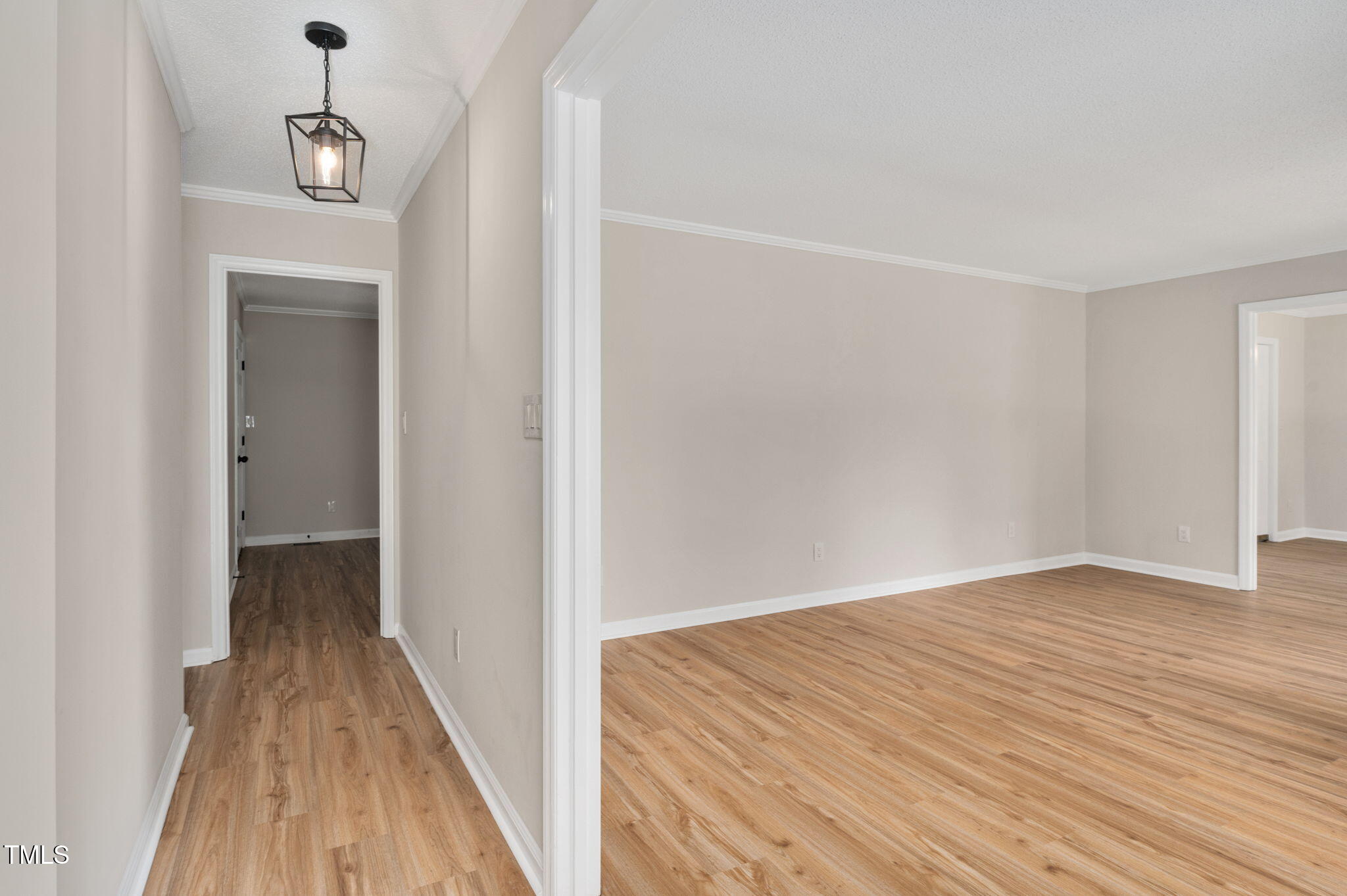 603 Warren Road Erwin, NC 28339 - Photo 7 of 38 a view of a room with wooden floor and staircase