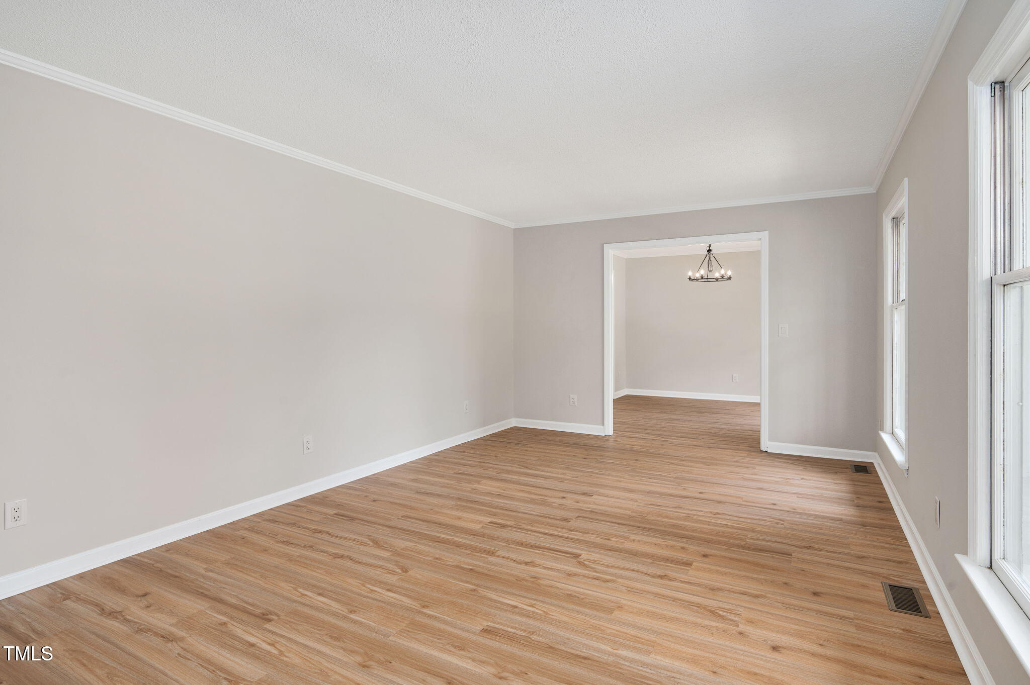 603 Warren Road Erwin, NC 28339 - Photo 8 of 38 a view of an empty room with wooden floor