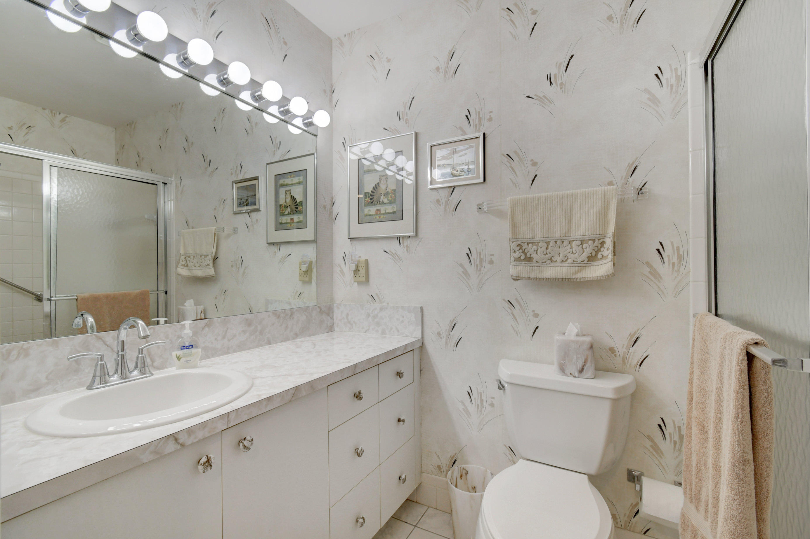 14163 Nesting Way, Unit D Delray Beach, FL 33484 - Photo 19 of 45 Guest Bathroom with shower stall