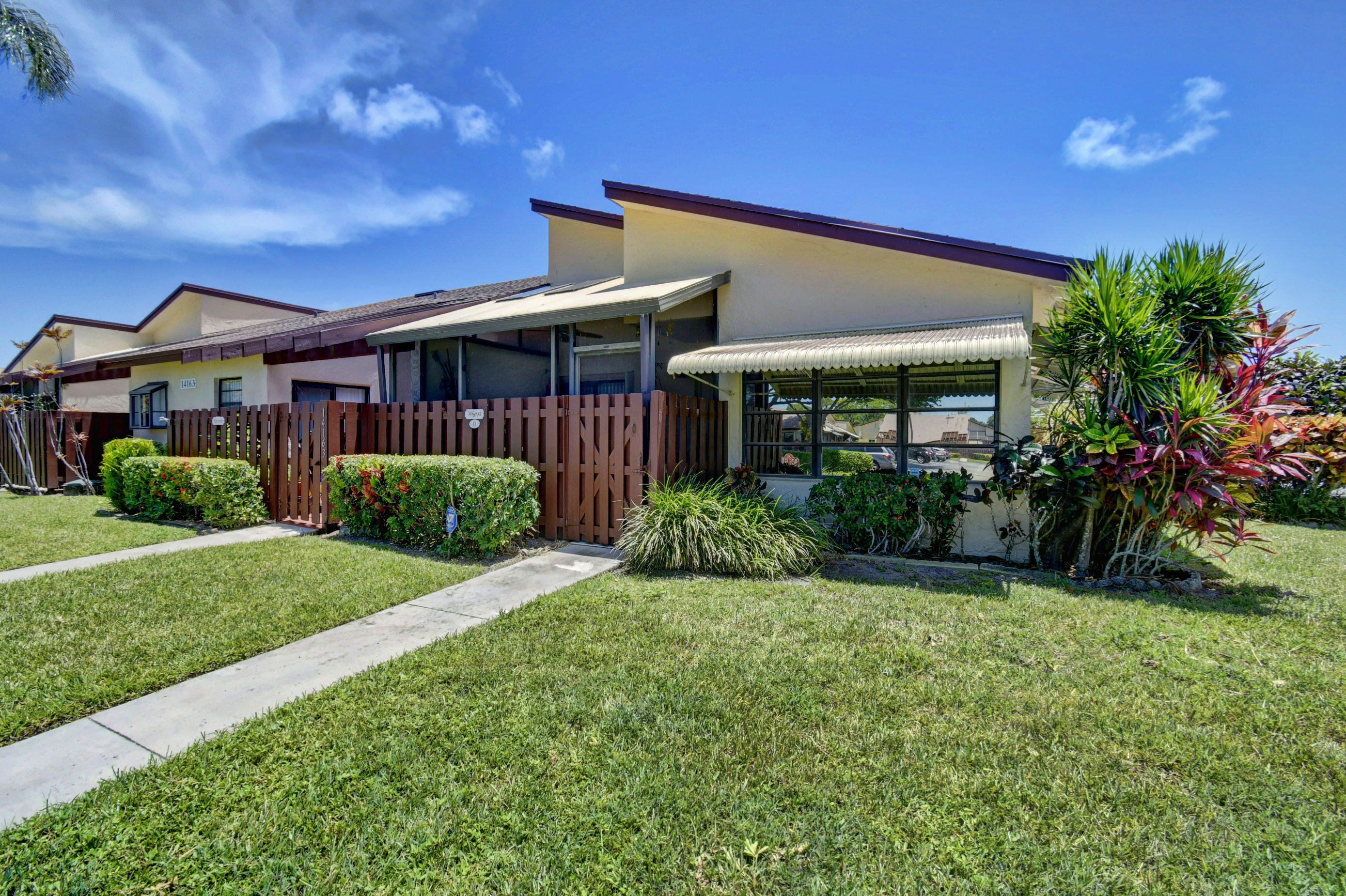 14163 Nesting Way, Unit D Delray Beach, FL 33484 - Photo 2 of 45 Front view of corner villa