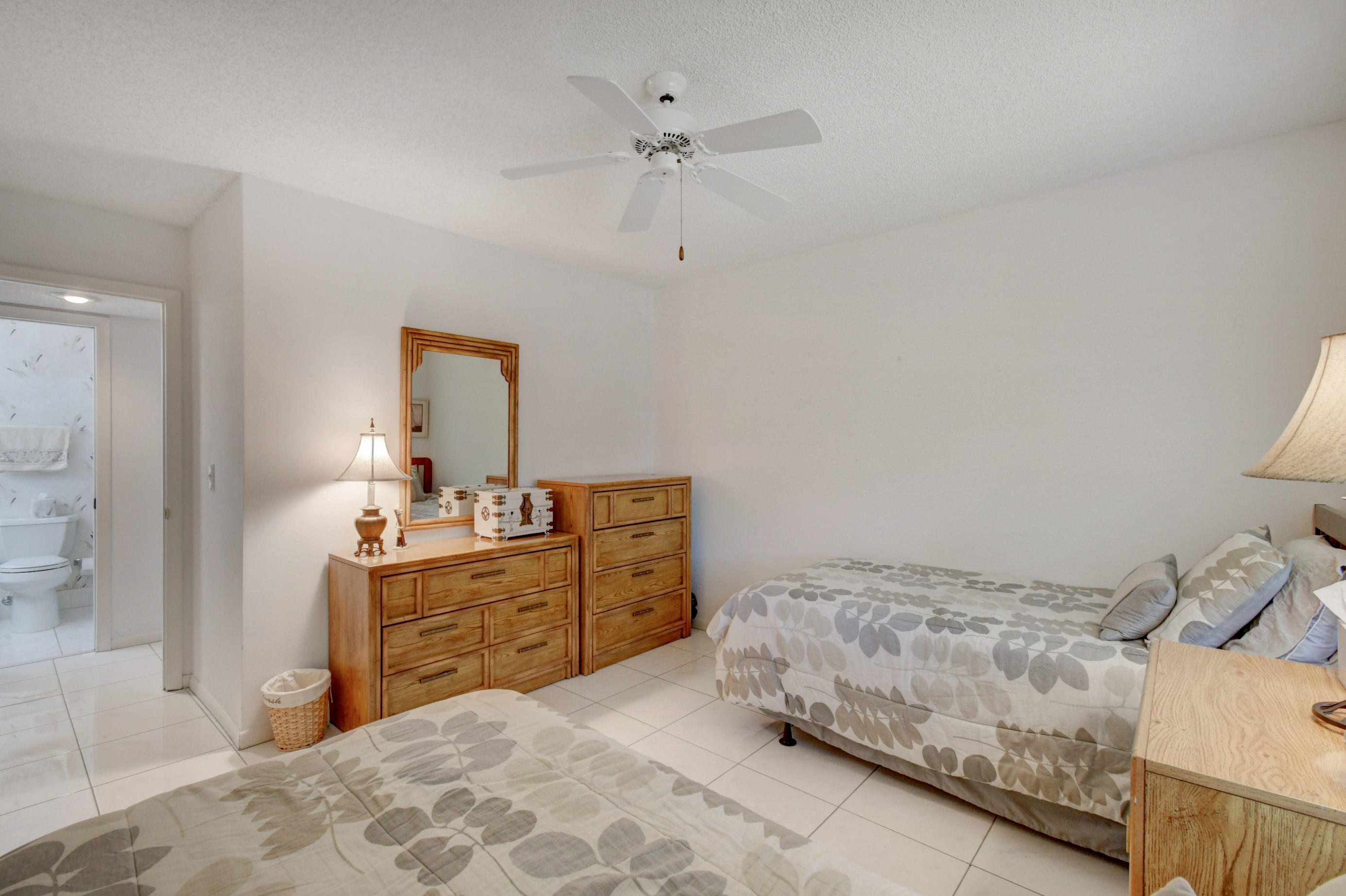 14163 Nesting Way, Unit D Delray Beach, FL 33484 - Photo 21 of 45 Guest bedroom