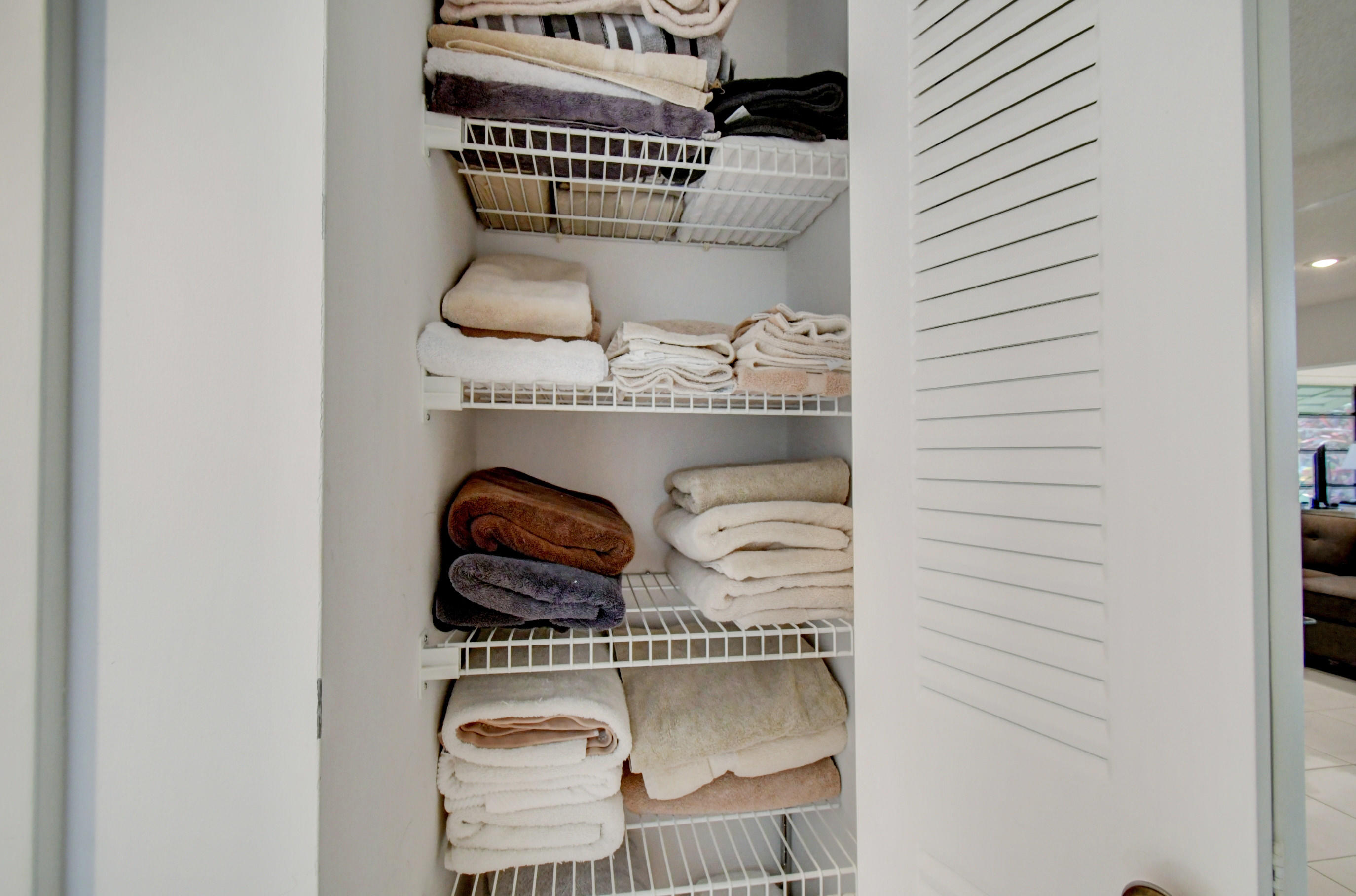 14163 Nesting Way, Unit D Delray Beach, FL 33484 - Photo 23 of 45 Hallway linen closet
