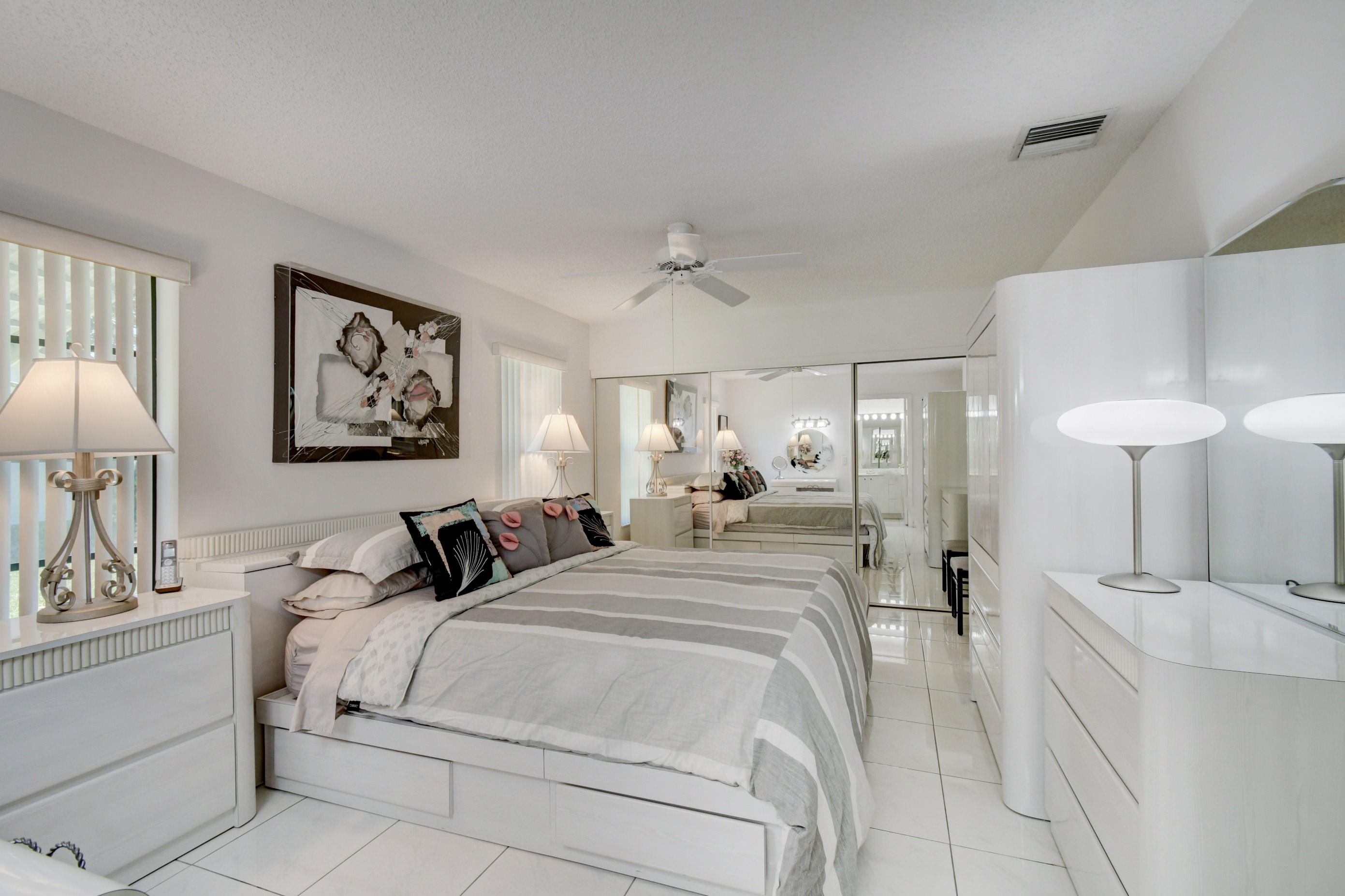14163 Nesting Way, Unit D Delray Beach, FL 33484 - Photo 25 of 45 Master bedroom with wall closet view