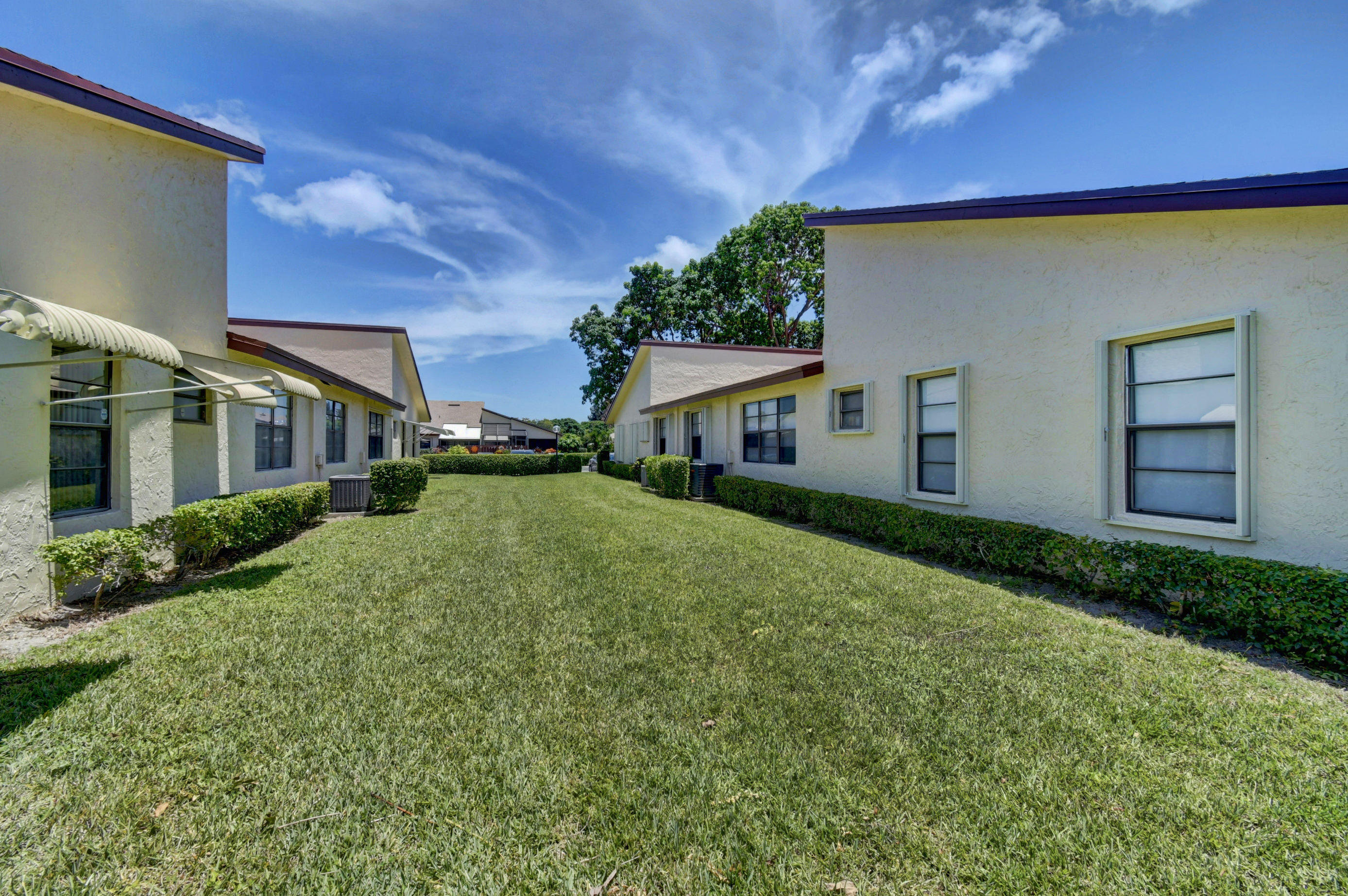 14163 Nesting Way, Unit D Delray Beach, FL 33484 - Photo 34 of 45 Rear view of corner villa