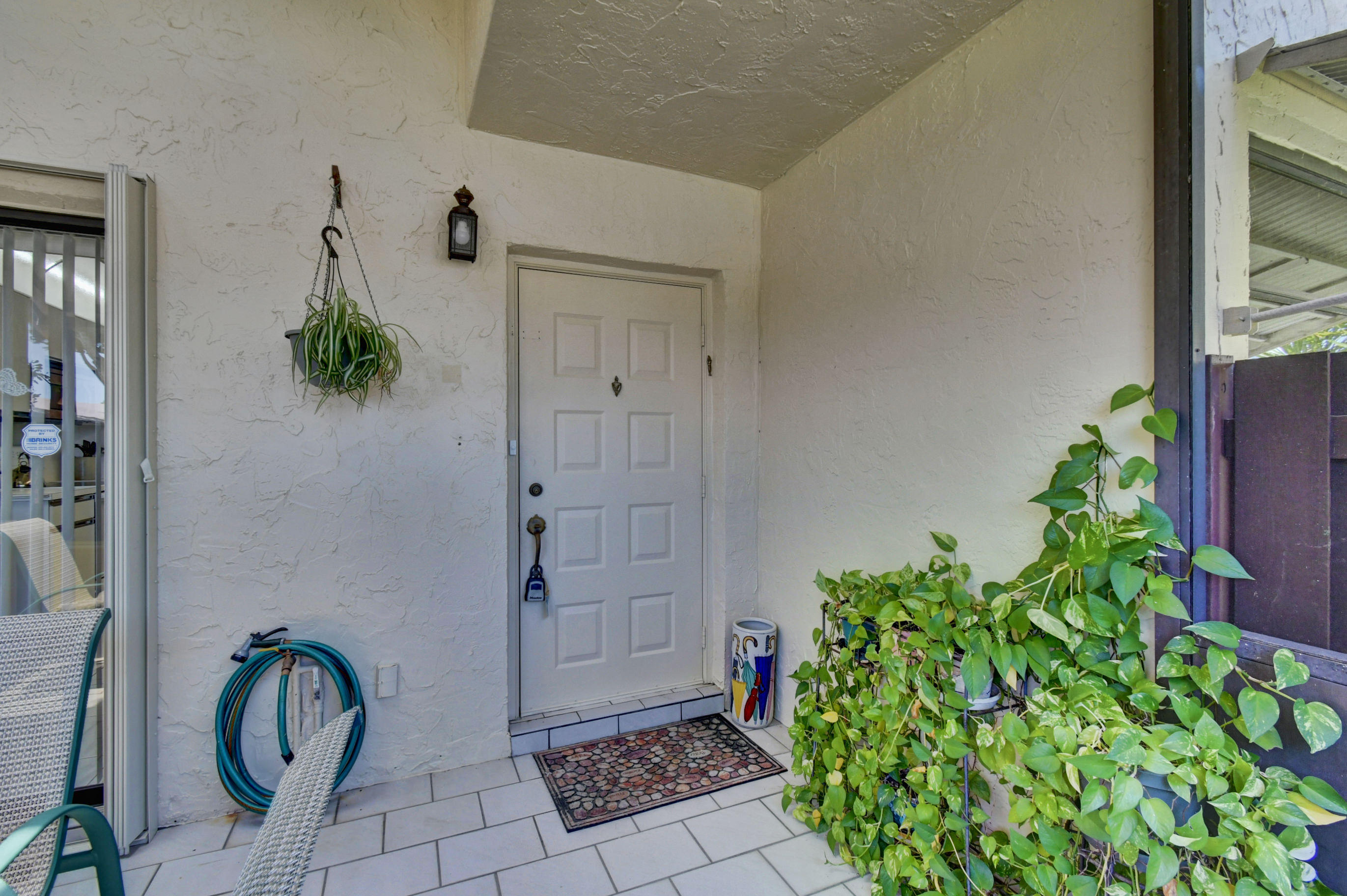 14163 Nesting Way, Unit D Delray Beach, FL 33484 - Photo 6 of 45 Villa entrance from patio