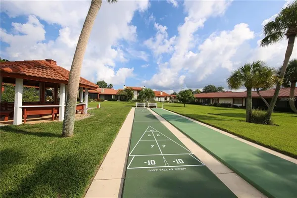 a view of an outdoor space and tennis court