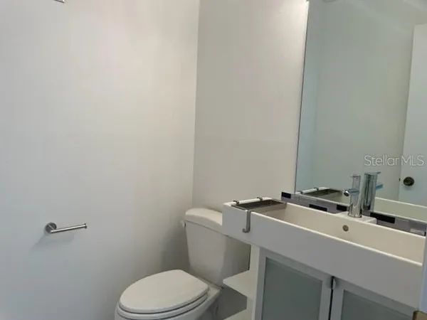 a bathroom with a sink and a toilet