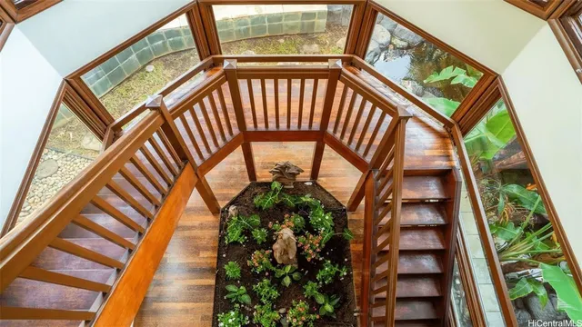 a bed room with furniture and a large window