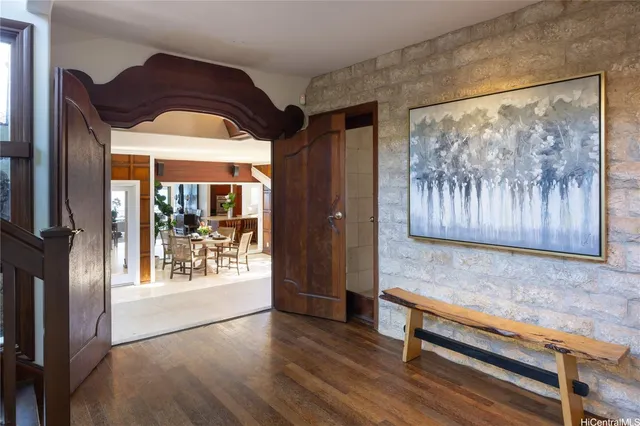 a bedroom with a large bed and a large window