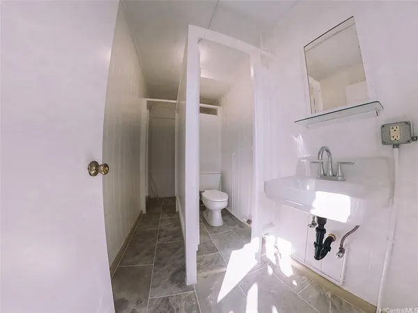 a bathroom with a sink and a toilet