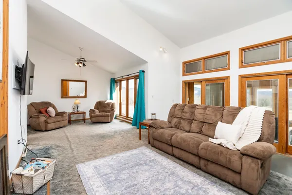 a bedroom with a bed and a fireplace