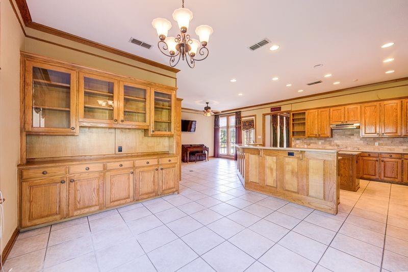 334 Farm To Market Road 2264 Decatur, TX 76234 - Photo 21 of 40 a large kitchen with stainless steel appliances lots of counter space and breakfast area
