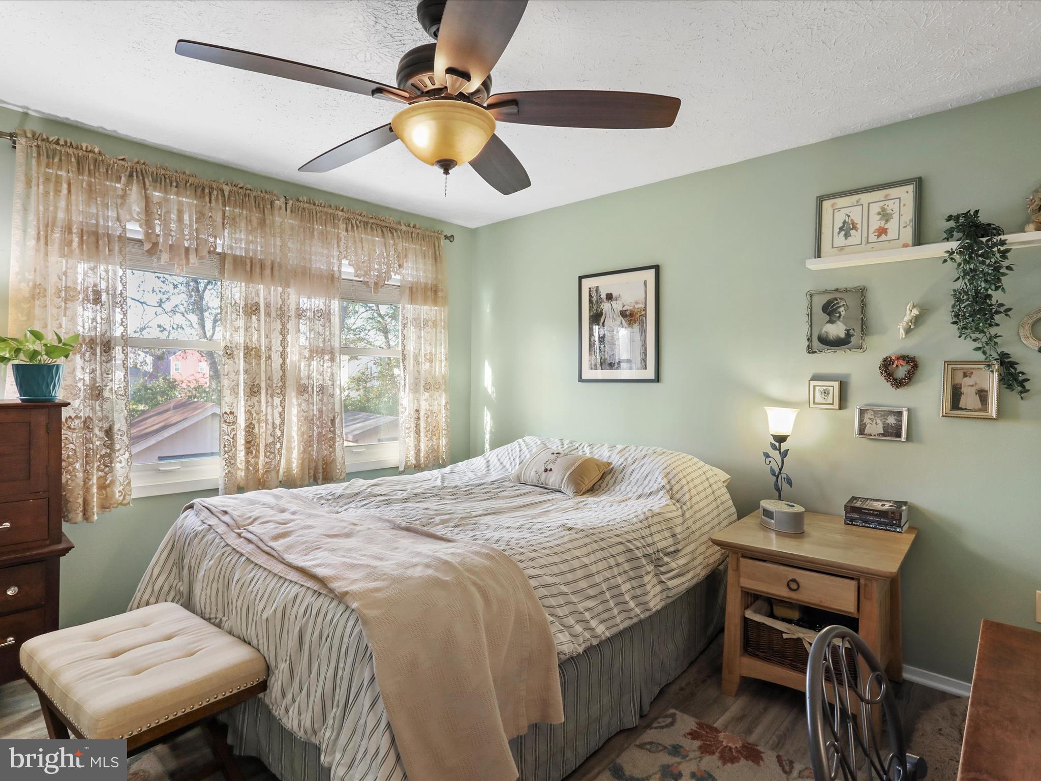 1589 Carey Place Frederick, MD 21701 - Photo 12 of 37 a bedroom with a bed and a table in it