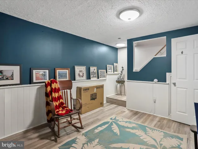 a bed room with a bed and furniture