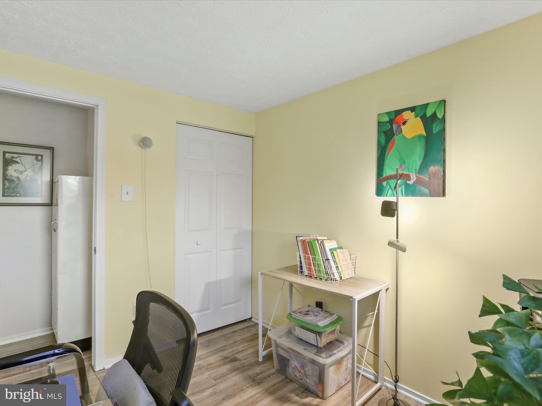 1589 Carey Place Frederick, MD 21701 - Photo 19 of 37 a view of a workspace with furniture and wooden floor