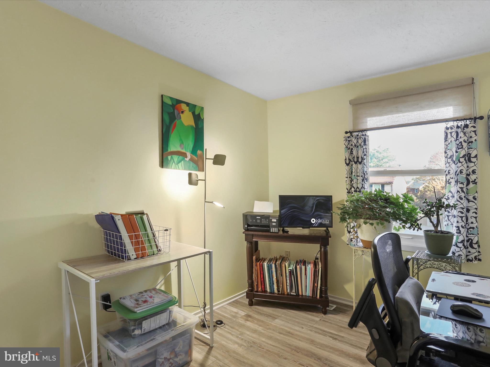 1589 Carey Place Frederick, MD 21701 - Photo 20 of 37 a view of a workspace with furniture and a window
