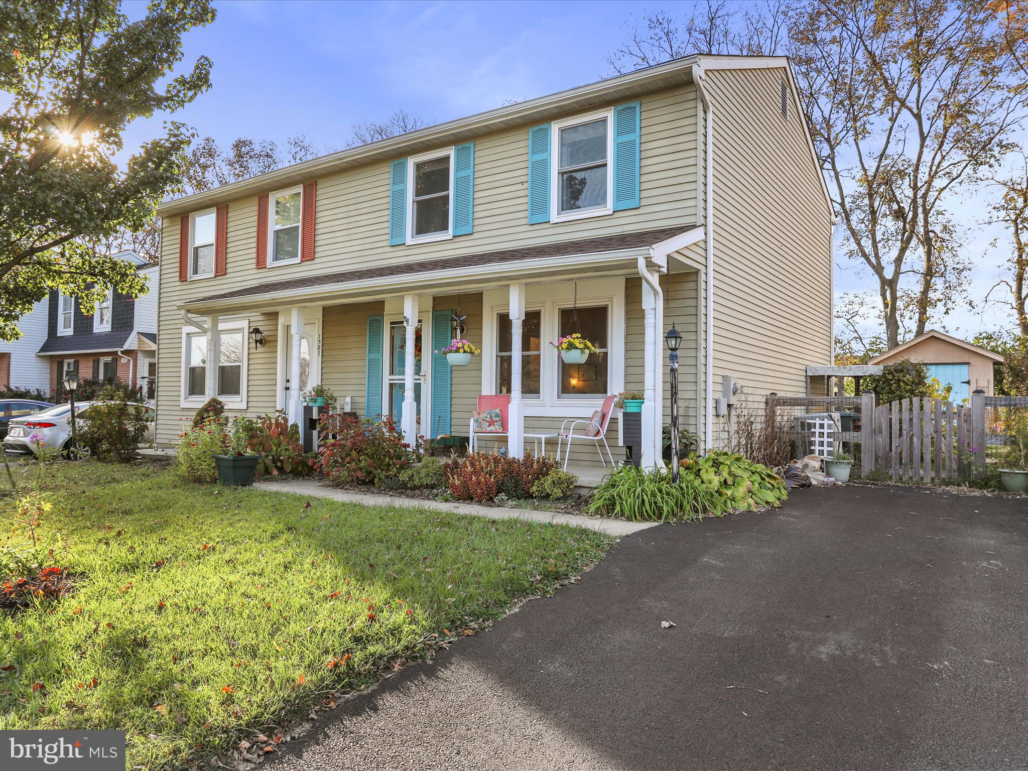 1589 Carey Place Frederick, MD 21701 - Photo 2 of 37 a front view of a house with a yard