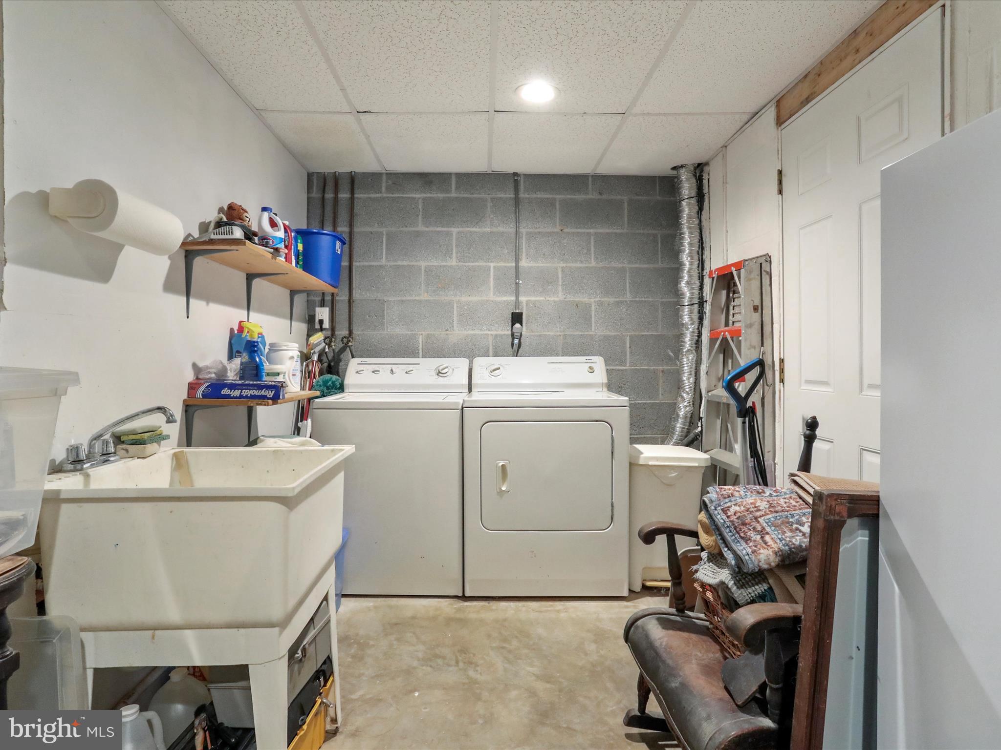 1589 Carey Place Frederick, MD 21701 - Photo 27 of 37 a utility room with dryer and washer