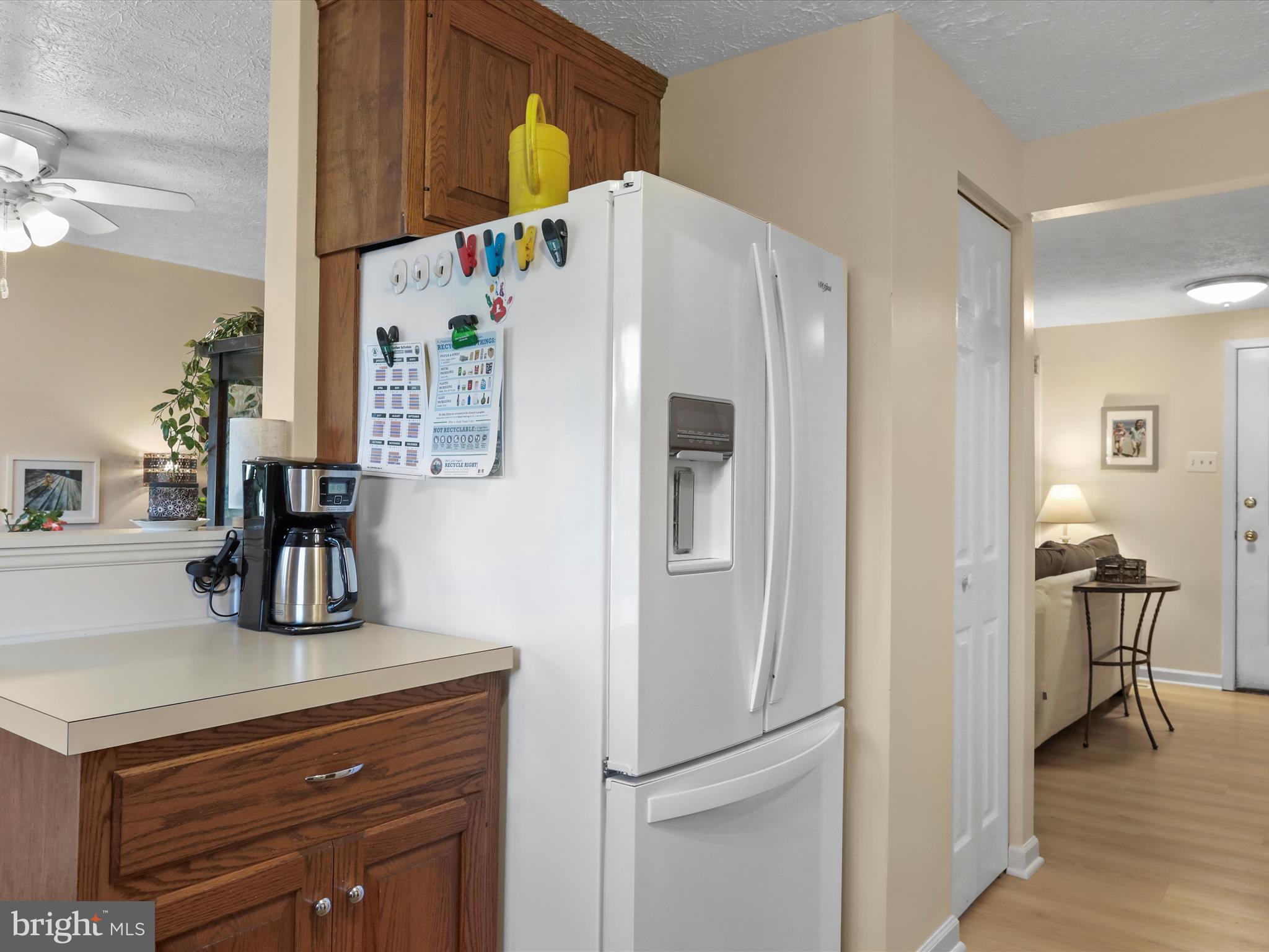 1589 Carey Place Frederick, MD 21701 - Photo 10 of 37 a kitchen with a refrigerator and a sink