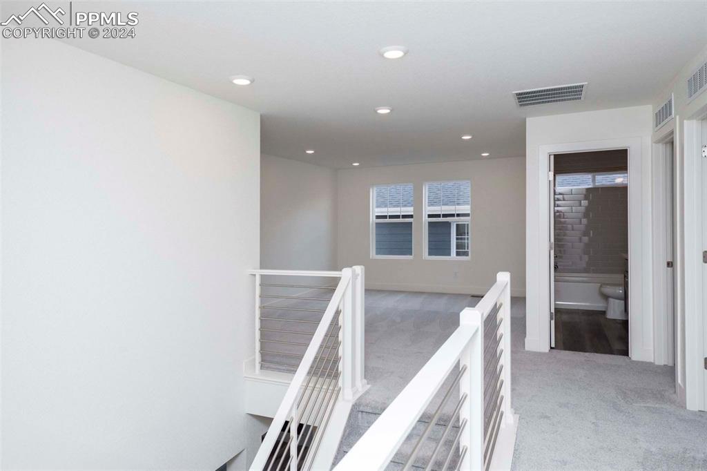 2058 Peachleaf Loop Castle Rock, CO 80108 - Photo 14 of 27 a view of kitchen and utility room