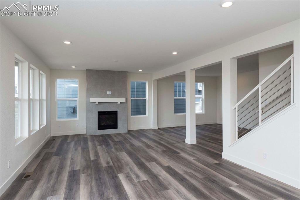 2058 Peachleaf Loop Castle Rock, CO 80108 - Photo 10 of 27 a view of a livingroom with wooden floor