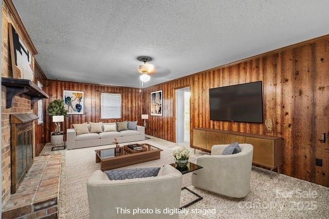 1214 Hawthorne Road Lancaster, SC 29720 - Photo 11 of 35 a living room with fireplace furniture and a flat screen tv