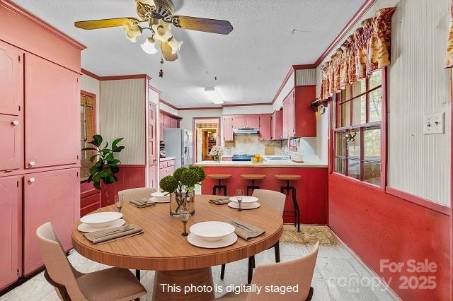 1214 Hawthorne Road Lancaster, SC 29720 - Photo 9 of 35 a view of a dining room with furniture and a chandelier