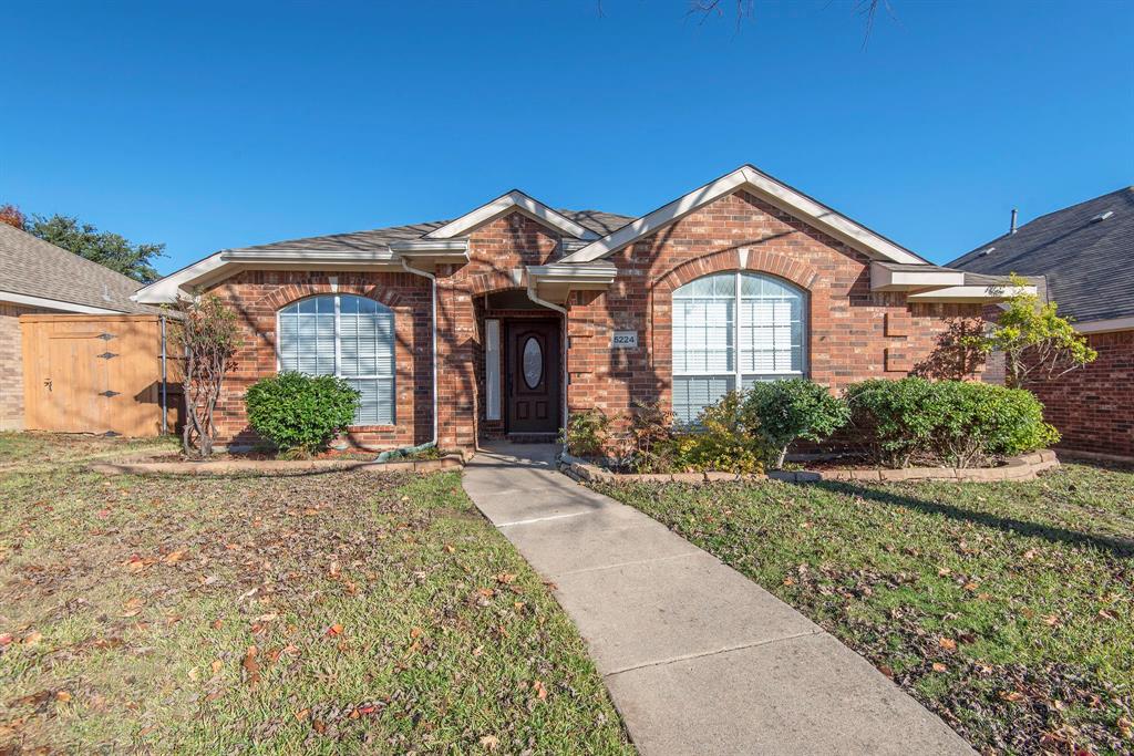5224 Evergreen Drive McKinney, TX 75070 - Photo 1 of 1 a front view of a house with a yard