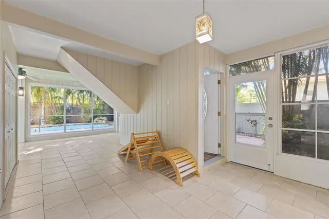 a view of swimming pool with seating area