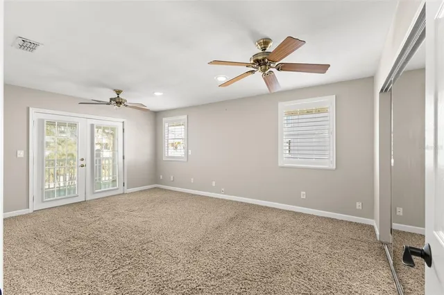 a view of a balcony with chairs