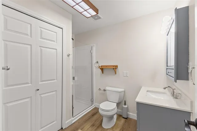 a view of entryway with workspace and windows