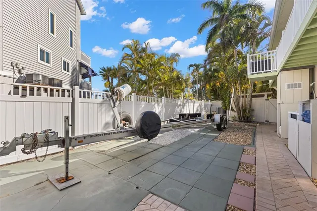 an aerial view of a house with a lake view