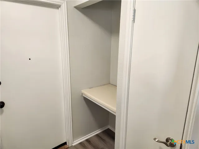 a small space with wooden floor