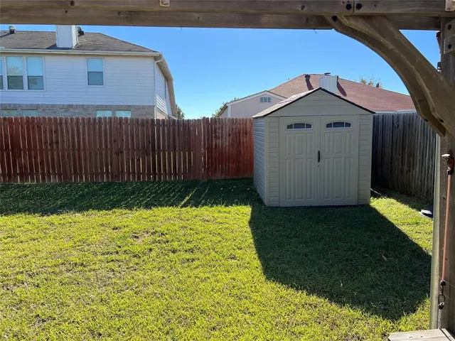 a house view with a garden space
