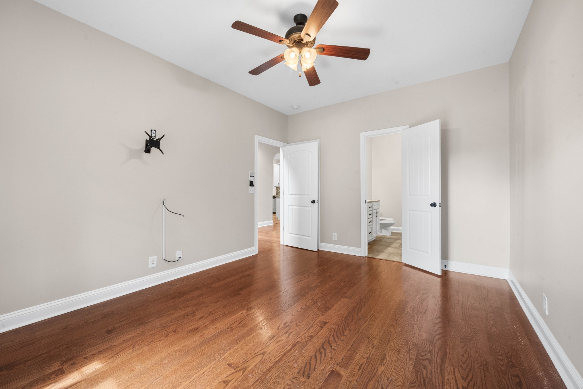 1789 Double R Boulevard Clarksville, TN 37042 - Photo 11 of 53 wooden floor in an empty room with a window