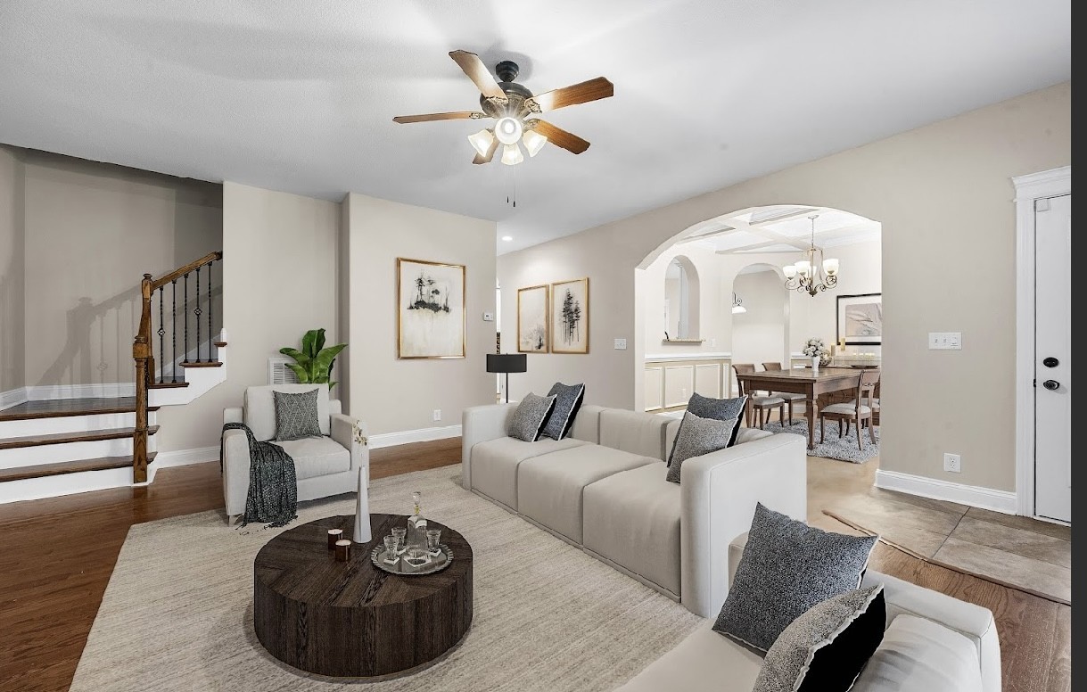 1789 Double R Boulevard Clarksville, TN 37042 - Photo 19 of 53 a living room with furniture a rug potted plant and a large window
