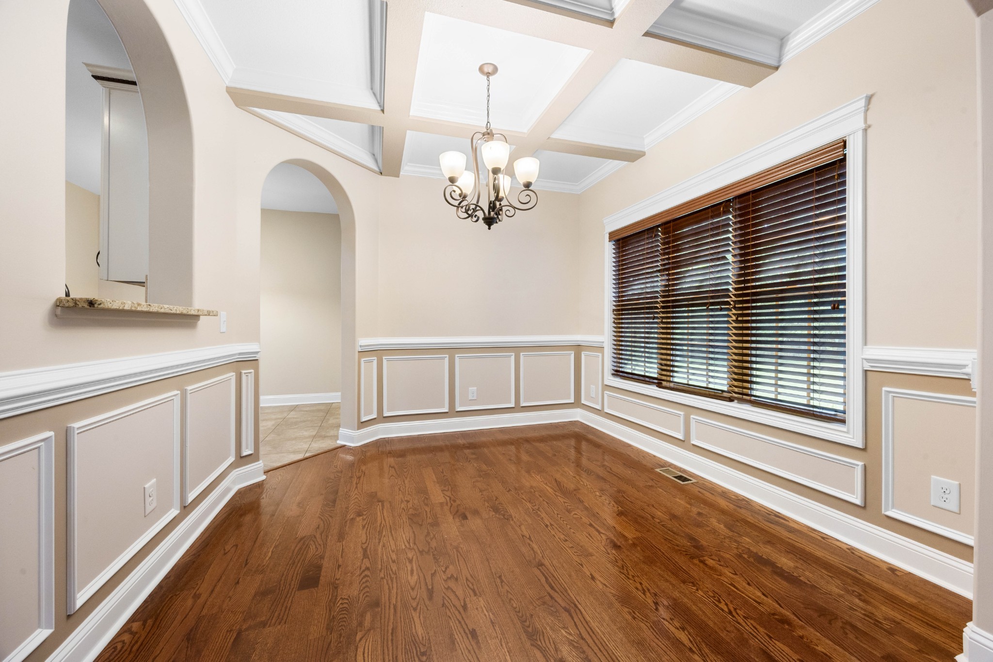 1789 Double R Boulevard Clarksville, TN 37042 - Photo 21 of 53 a view of a kitchen with wooden floor and a ceiling fan
