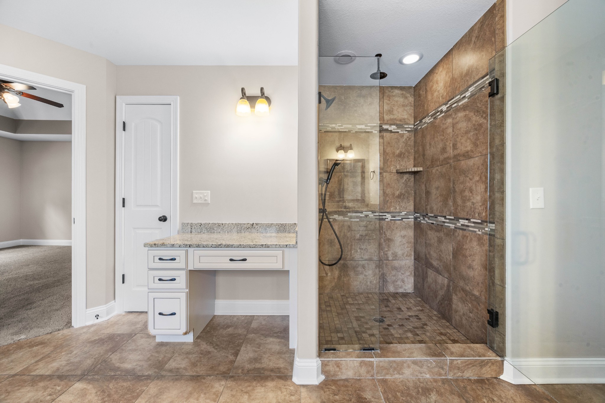 1789 Double R Boulevard Clarksville, TN 37042 - Photo 36 of 53 a bathroom with a glass shower door