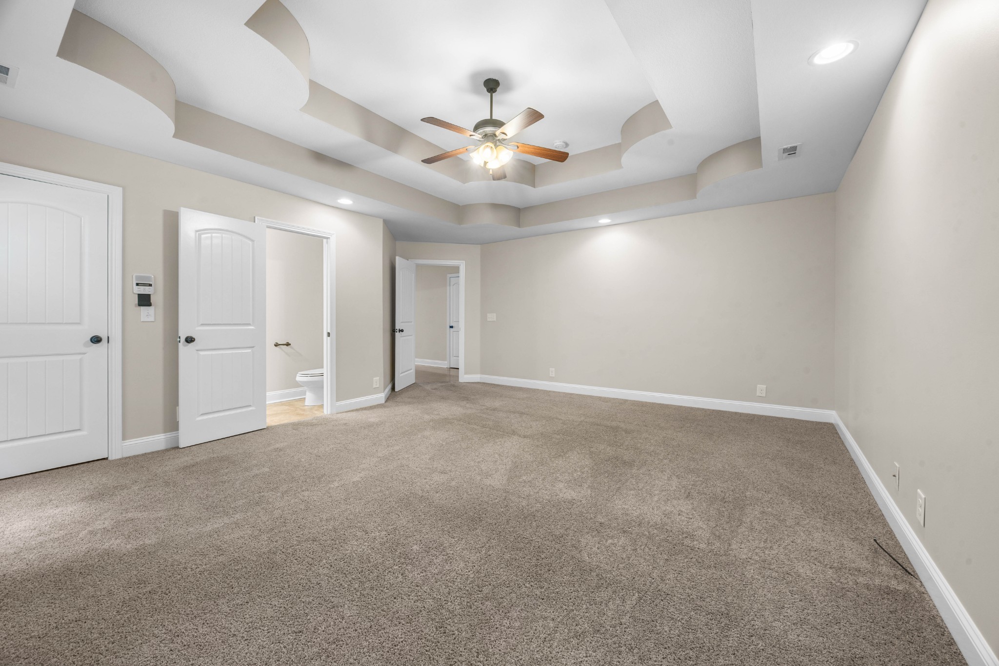 1789 Double R Boulevard Clarksville, TN 37042 - Photo 39 of 53 an empty room with ceiling fan and window