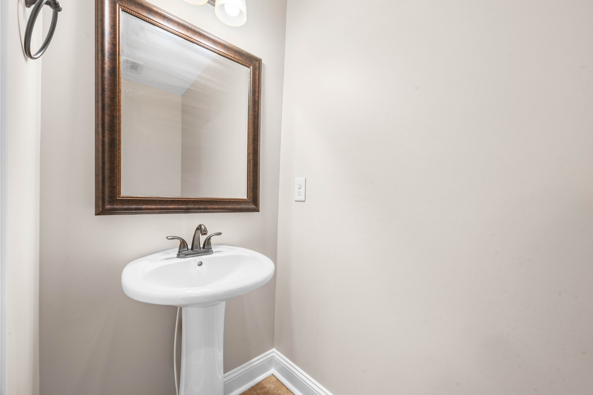 1789 Double R Boulevard Clarksville, TN 37042 - Photo 40 of 53 a bathroom with a sink and a mirror