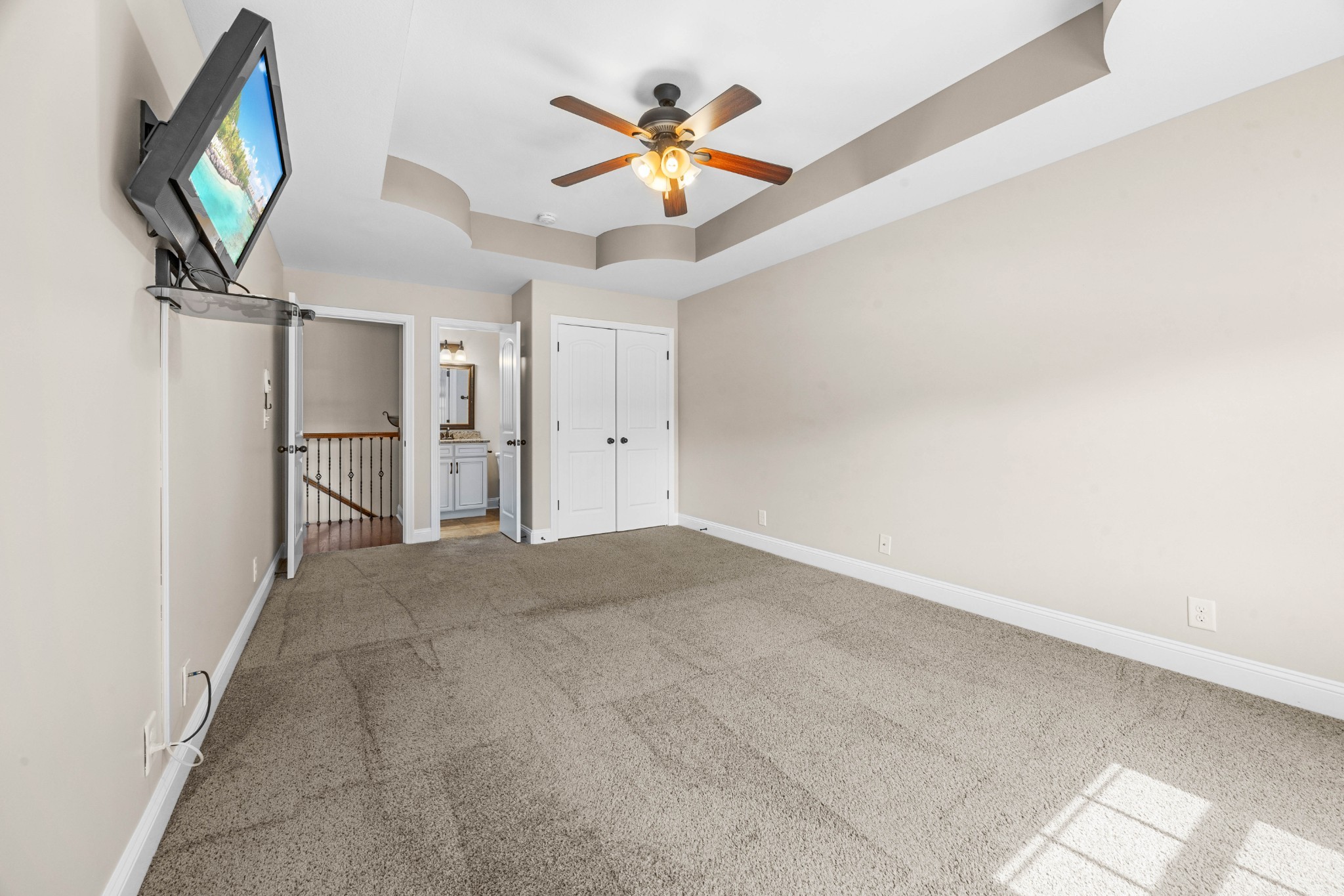 1789 Double R Boulevard Clarksville, TN 37042 - Photo 45 of 53 a view of a livingroom with a ceiling fan and a workspace