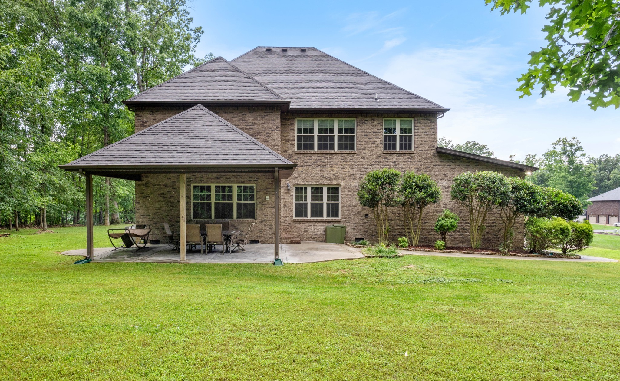 1789 Double R Boulevard Clarksville, TN 37042 - Photo 47 of 53 a front view of a house with a garden and trees