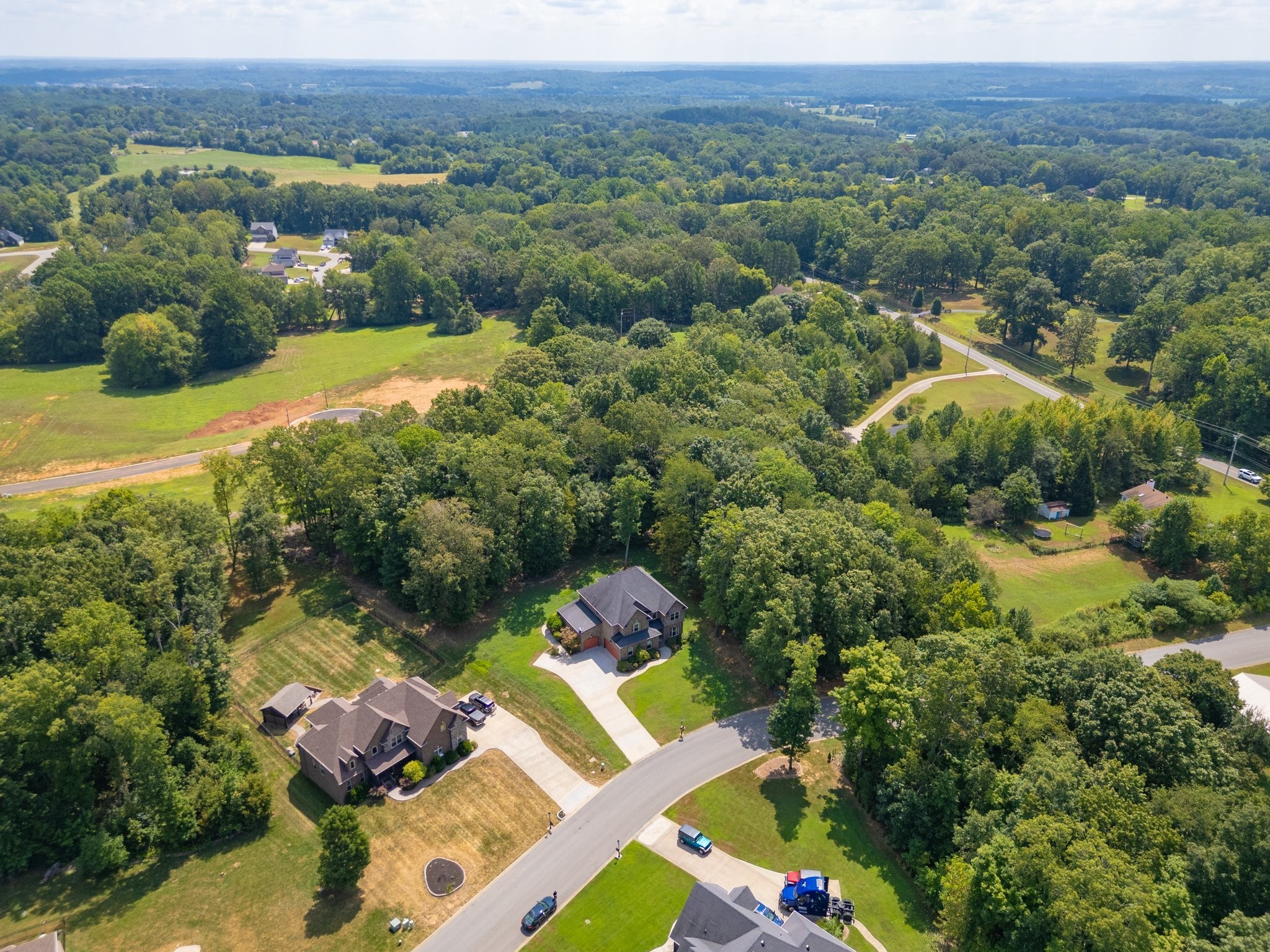 1789 Double R Boulevard Clarksville, TN 37042 - Photo 8 of 53 an aerial view of residential house with outdoor space and lake view