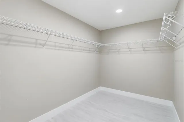 a view of a room with racks on the wall