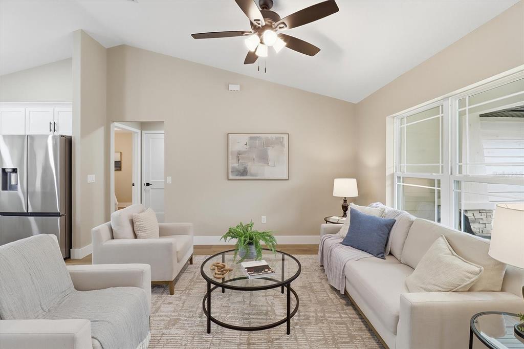 3671 East Ryan Street Inverness, FL 34453 - Photo 7 of 48 a living room with furniture and a large window