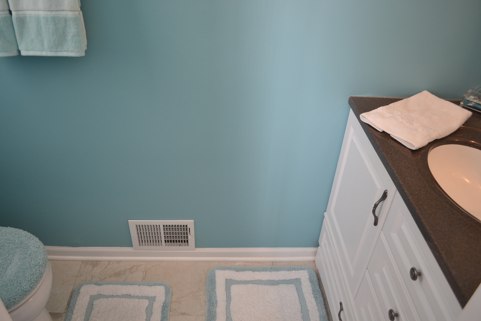 1025 West Kennedy Road Braidwood, IL 60408 - Photo 22 of 32 a bathroom with a sink and a mirror