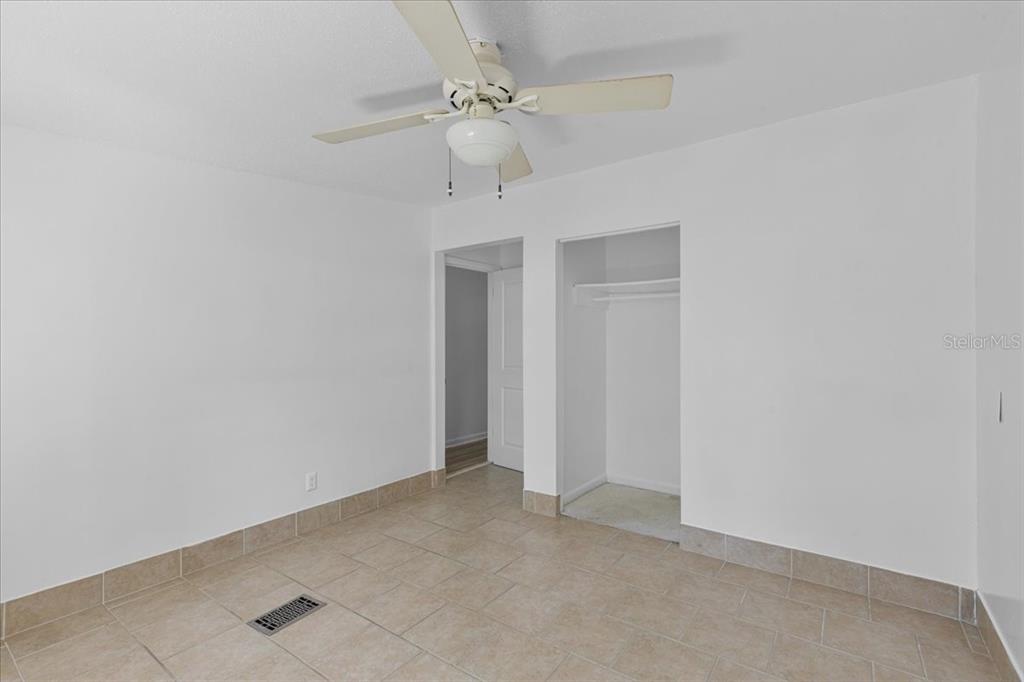 1149 Shell Crest Avenue Cedar Key, FL 32625 - Photo 18 of 32 a view of a chandelier fan in a room
