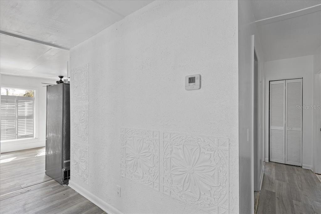 1149 Shell Crest Avenue Cedar Key, FL 32625 - Photo 22 of 32 a view of a hallway with wooden floor