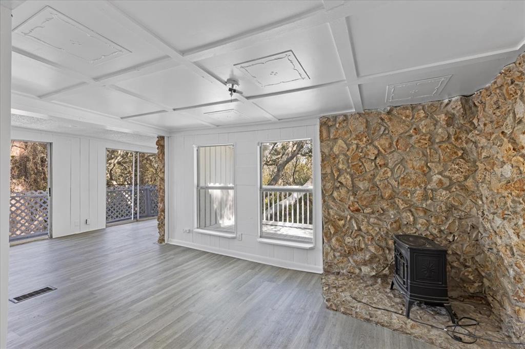 1149 Shell Crest Avenue Cedar Key, FL 32625 - Photo 25 of 32 a view of entryway with wooden floor