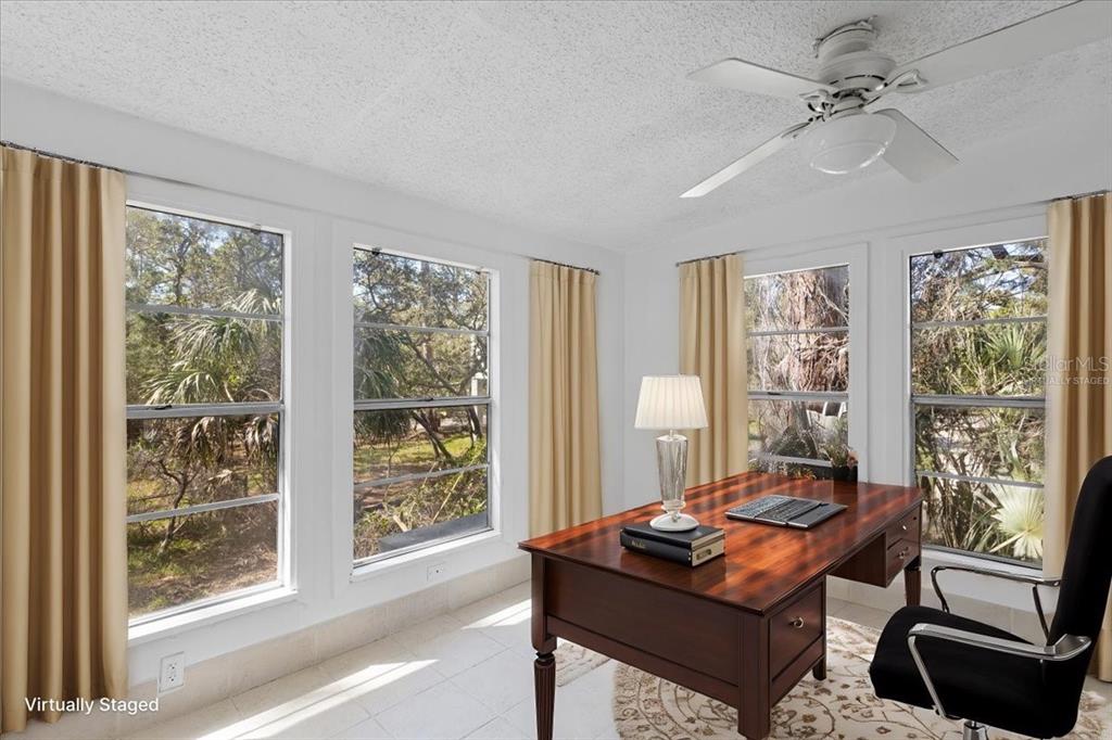 1149 Shell Crest Avenue Cedar Key, FL 32625 - Photo 29 of 32 a room with furniture and windows